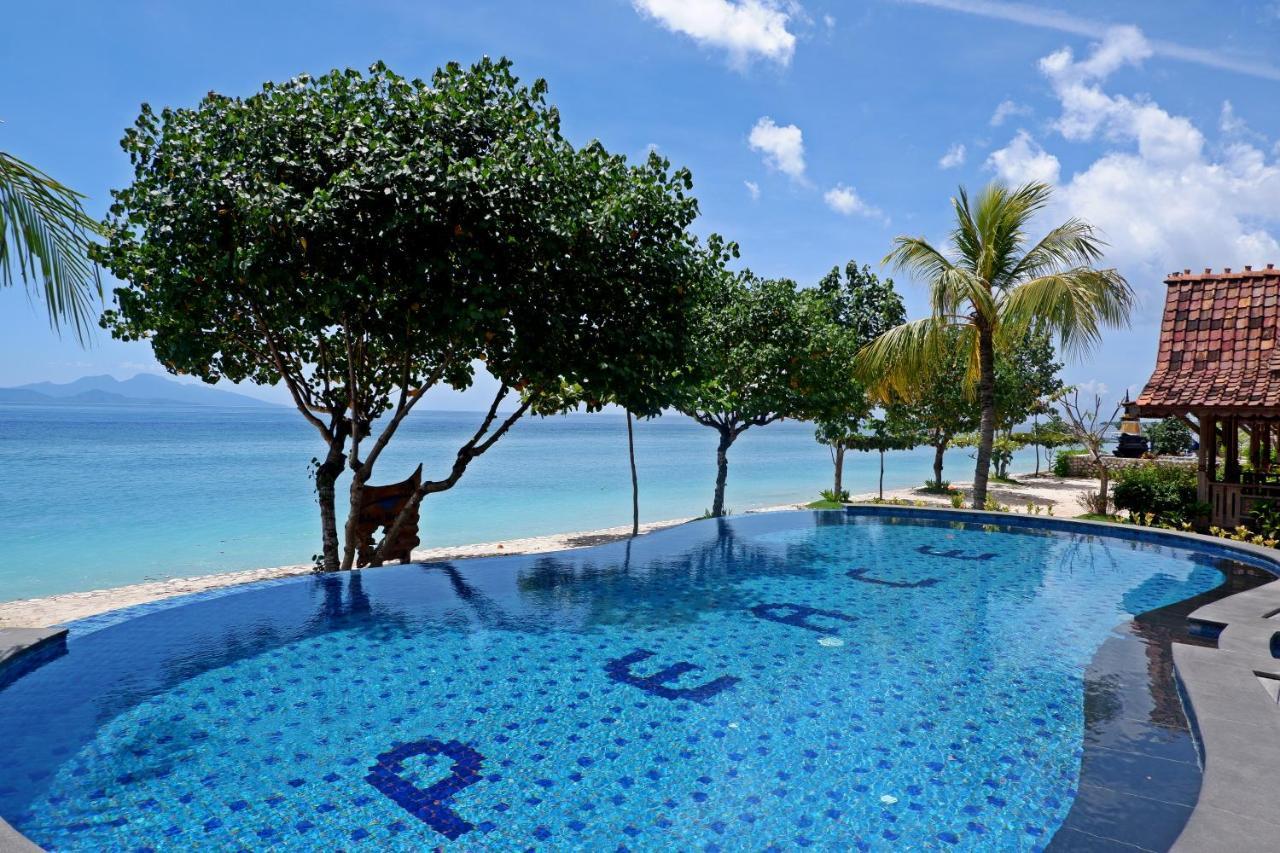 Blue Harbor Beachfront & Resto होटल 4*